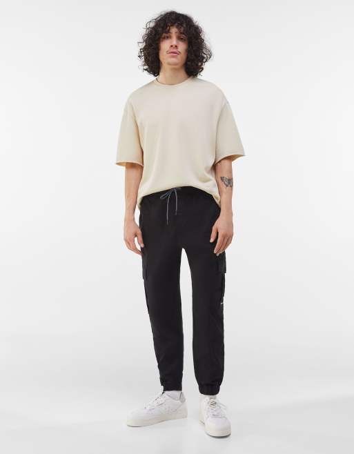 Bershka belted cargo trousers in black ASOS