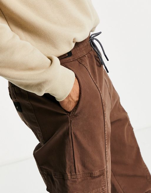 Bershka cuffed cargo pants in brown exclusive at ASOS