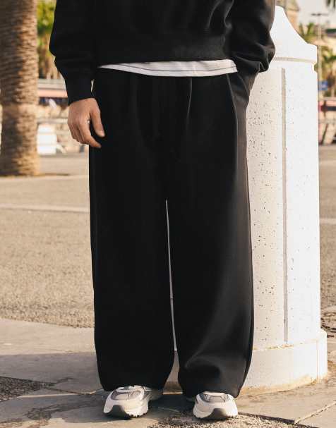 Bershka Bonded pleated volume jogger trousers in black - view 1