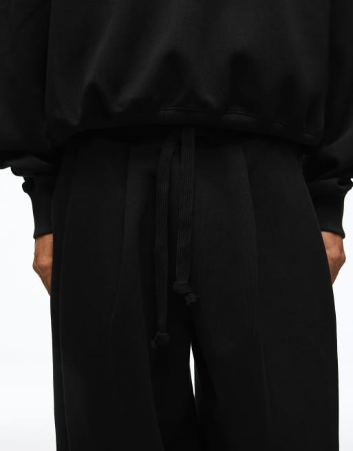 Bershka Bonded pleated volume jogger trousers in black, 7 of 7