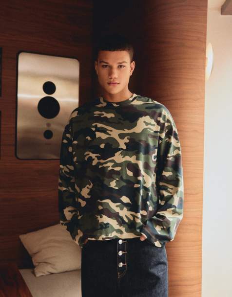 Bershka Boxy long sleeve t-shirt in camo print in green - view 1