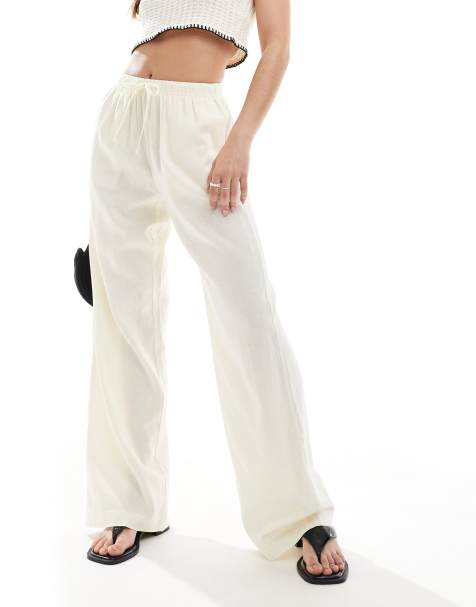 Bershka - Broek van linnenmix met gestrikte taille en wijde pijpen in botergeel - view 1