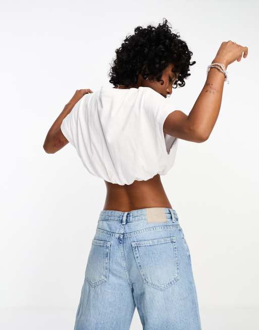 High-waist denims with white bubble croptop