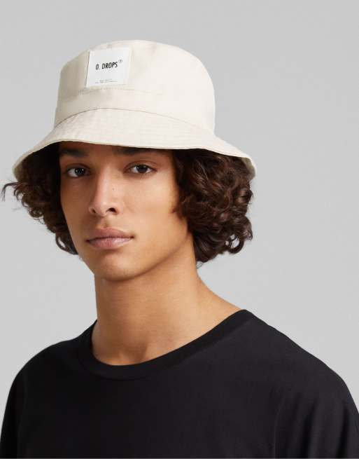 Bershka Bucket hat in ecru ASOS