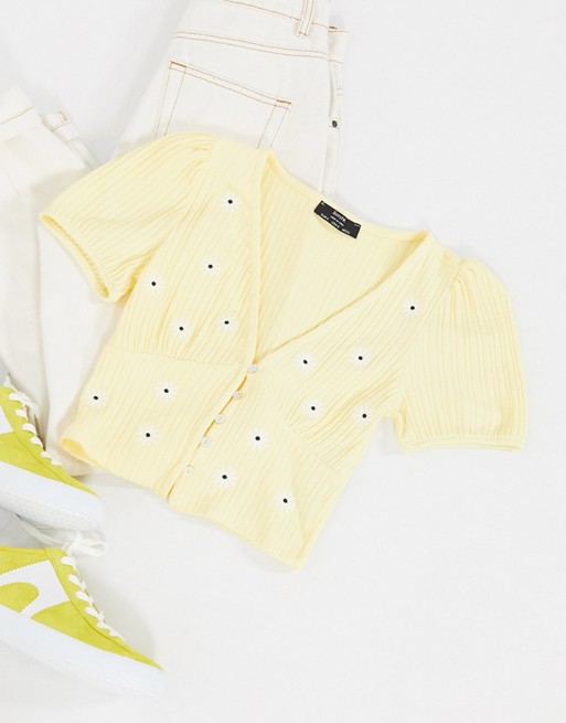 Bershka button down cropped daisy print t-shirt in yellow