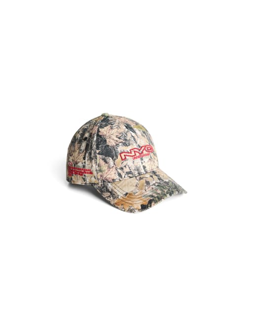 Bershka - Cappellino verde con stampa di foglie