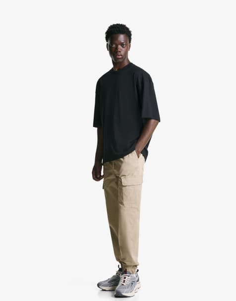 Bershka Cargo jogger trousers in camel - view 1