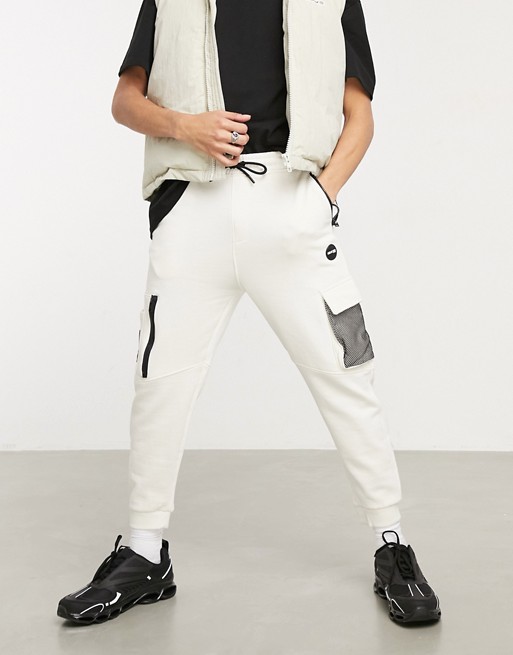Bershka cargo joggers with mesh detail in white