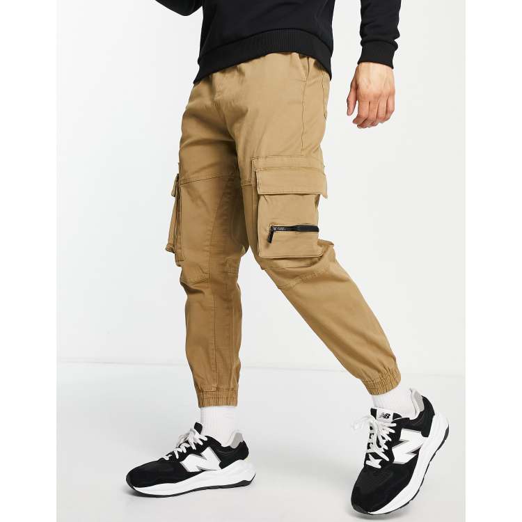 Bershka cargo pants in beige ASOS