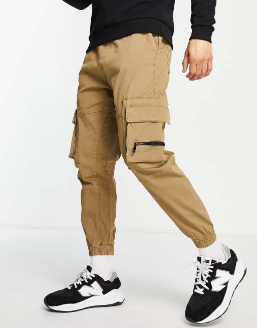 Bershka cuffed cargo pants in brown exclusive at ASOS