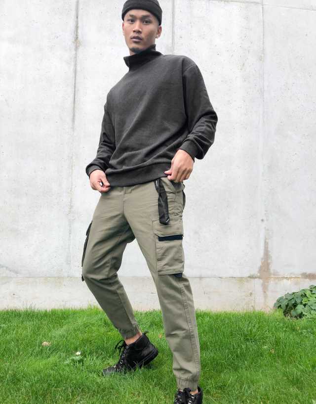 Bershka cargo pants in khaki with belt