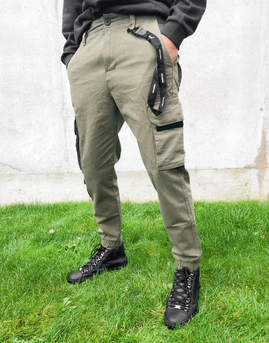 Bershka cargo pants with black trim detail in khaki-Green