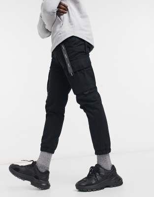 Bershka cargo pants with key chain in black