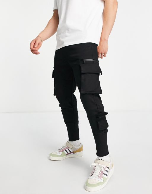 Bershka cargo pants with pockets in black | ASOS