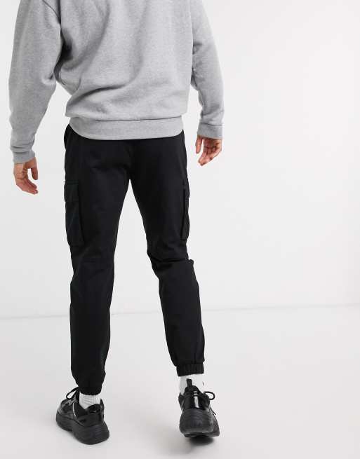 Bershka cargo sweatpants with belt in black ASOS