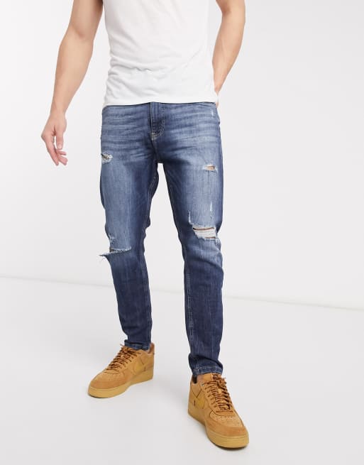 Bershka carrot fit jeans in blue | ASOS