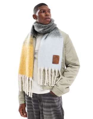 check multicolored scarf in brown