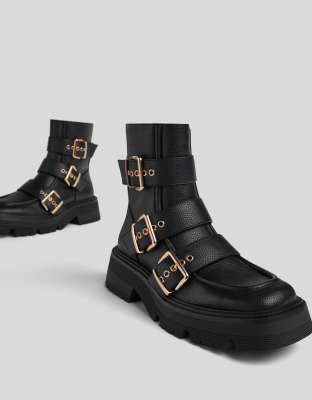 chunky black boots with buckles