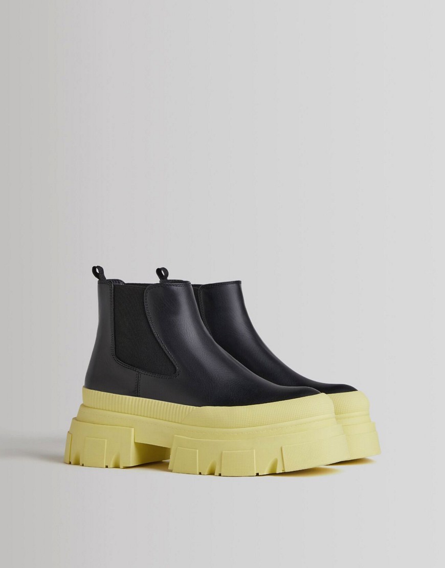 Bershka chunky flat chelsea boot with contrast yellow sole in black