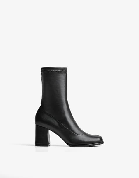 Bershka Chunky heel ankle boots in black - view 1