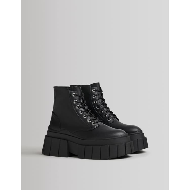 Bershka chunky lace up biker boot in black