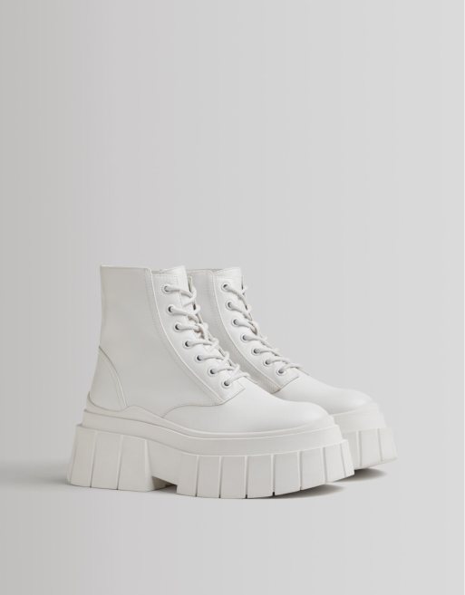 Bershka chunky lace up biker boot in white | ASOS