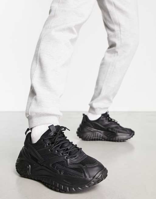 Bershka chunky lace up runner trainers in black | ASOS