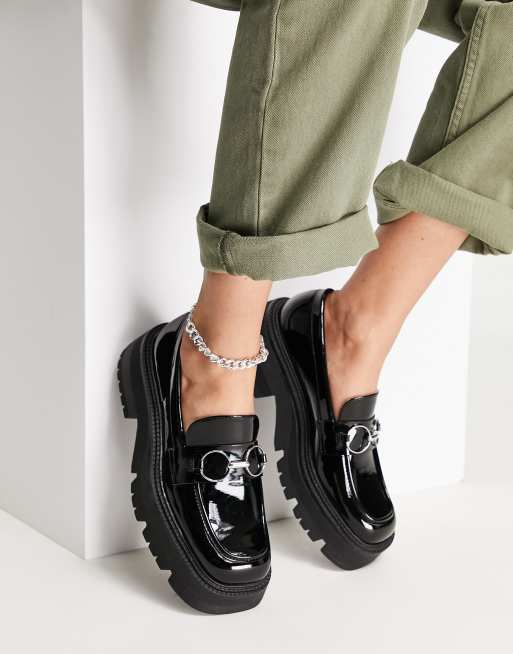 Black patent store platform brogues