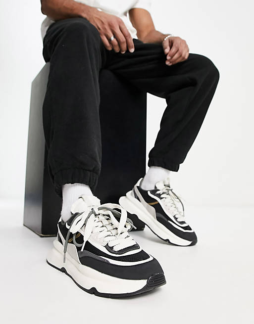 Bershka chunky runner sneakers in black & white | ASOS