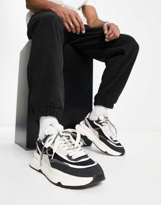 Bershka chunky running sneakers in black & white ASOS