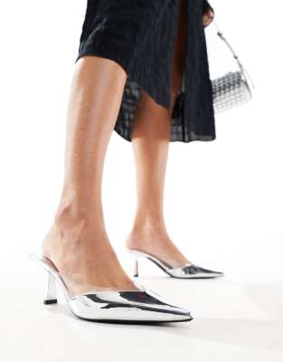 clear heeled pumps in silver