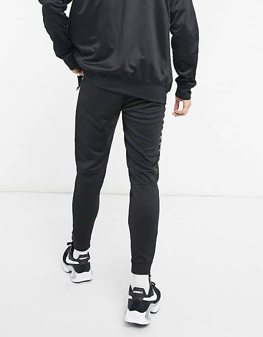 Tracksuits Bershka co-ord tracksuit joggers in black with side print 
