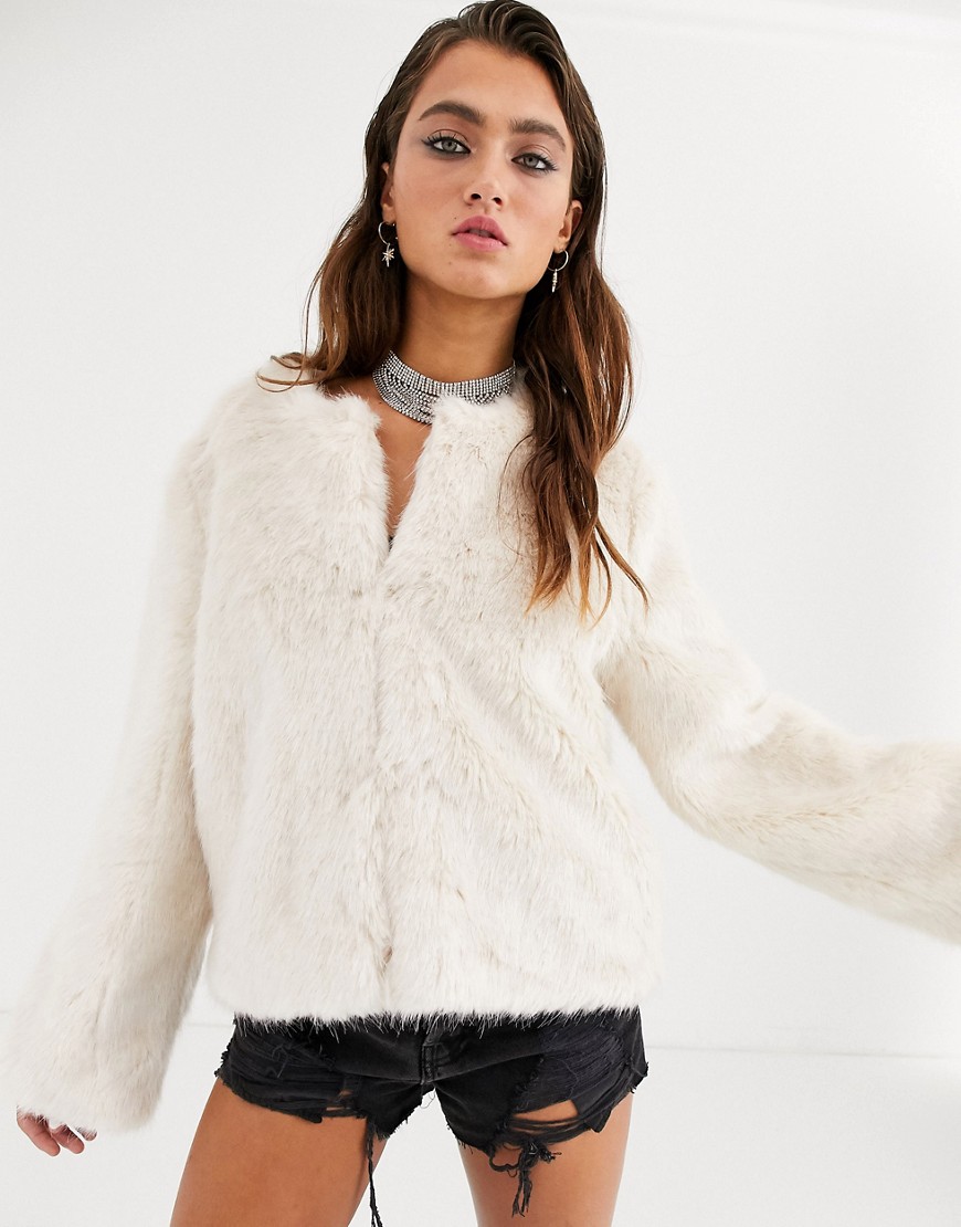 Bershka collarless faux fur coat in ecru-Cream