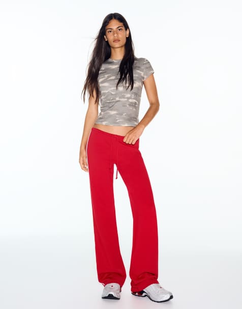 Bershka Contrast side-stripe joggers in red - view 1
