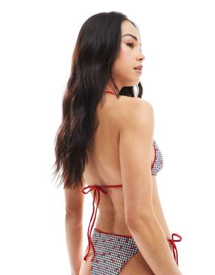 Shop Bershka Contrast Trim Gingham And Cherry Print Bikini Top In Black