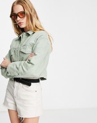 Bershka cotton canvas jacket with large pockets in sage