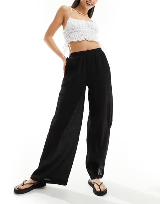 Bershka crinkle wide leg pants in black