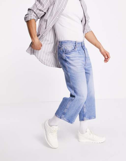 Bershka - Cropped jeans met wijde pijpen in lichtblauw