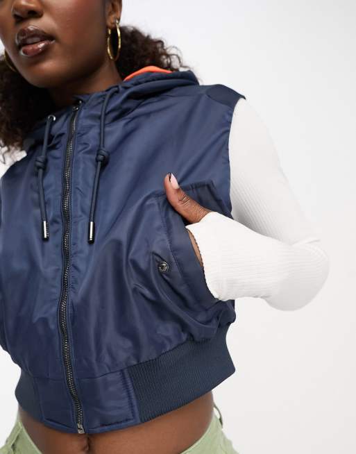 Bershka cropped utility vest with contrast hood in navy | ASOS