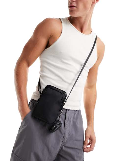Bershka cross body phone bag in black ASOS