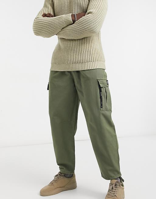 Bershka cuffed cargo pants in khaki | ASOS