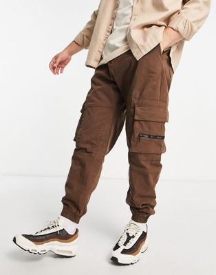 Bershka cuffed cargo trousers in brown exclusive at ASOS