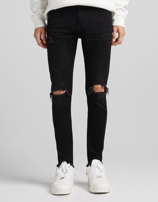 Bershka – Czarne bardzo obcisłe jeansy z przetarciami