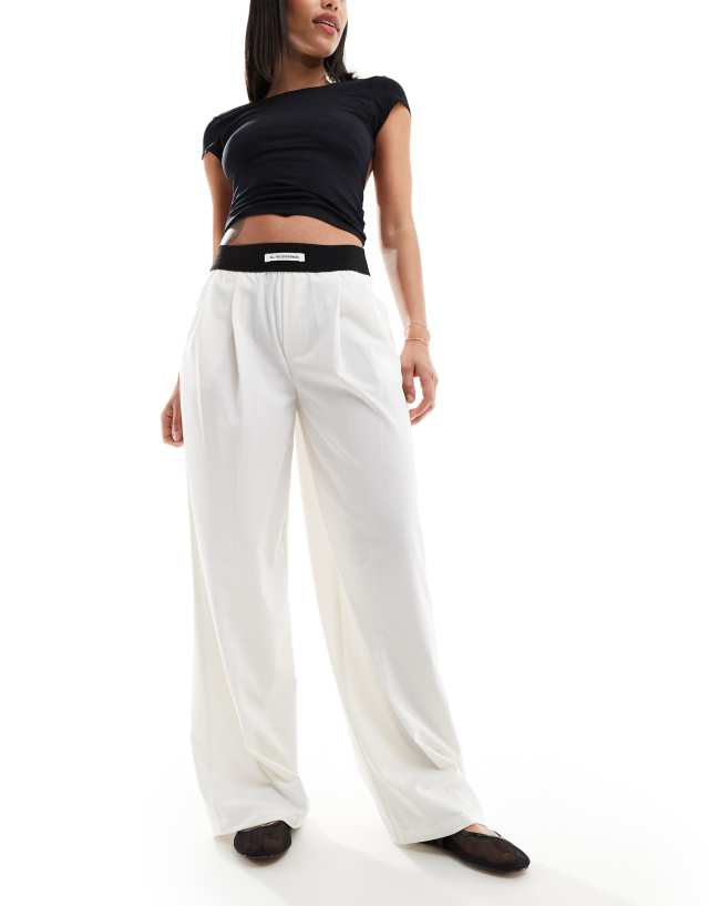 Bershka - deep waistband wide leg trousers in light grey