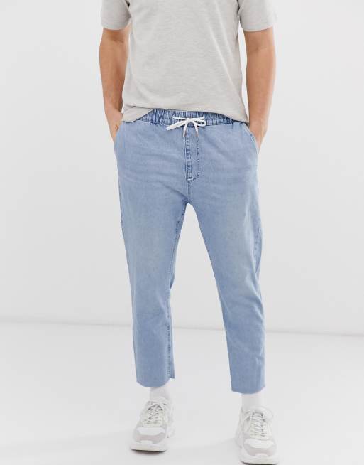 Light blue denim joggers sale