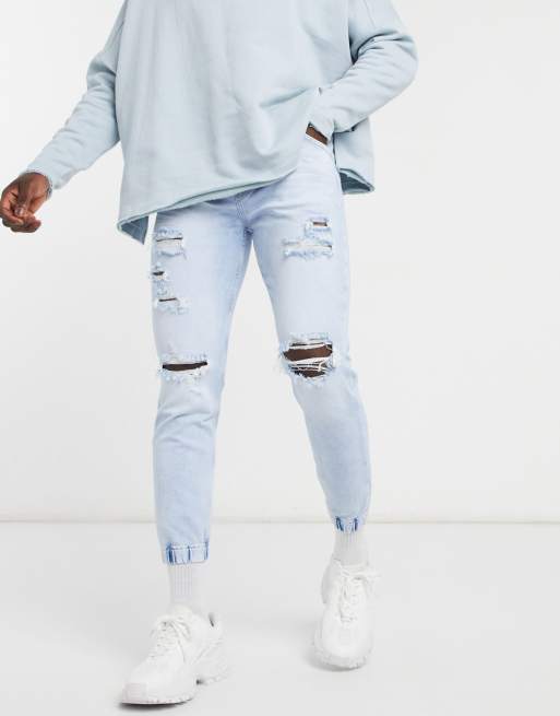 Bershka denim joggers with rips in light blue wash