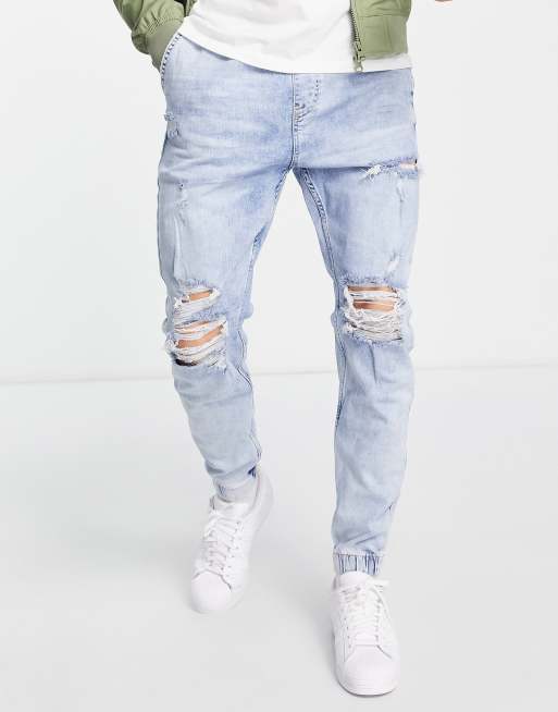 Bershka denim joggers with rips in light blue wash