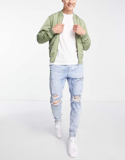 Bershka denim joggers with rips in light blue wash