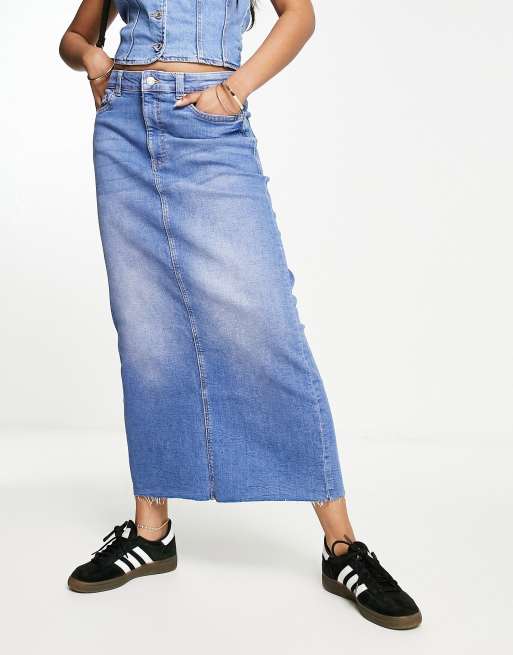 Bershka denim midi skirt with raw hem in washed mid blue | ASOS