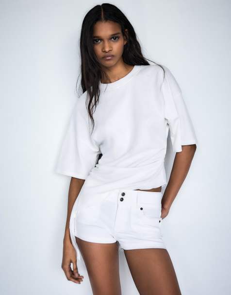 Bershka Denim mini shorts in white - view 1